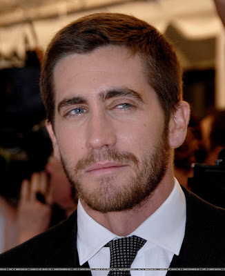 Image result for man thin face black hair heavy eyebrows unshaven